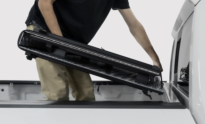 Access 2022+ Rivian R1T 4ft 6in Bed (w/ OEM Tonneau Track) LOMAX Folding Hard Cover - Black Urethane